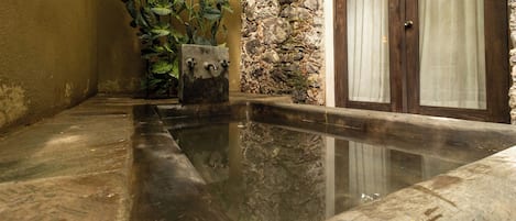 Premium bedding, down comforters, pillowtop beds, in-room safe