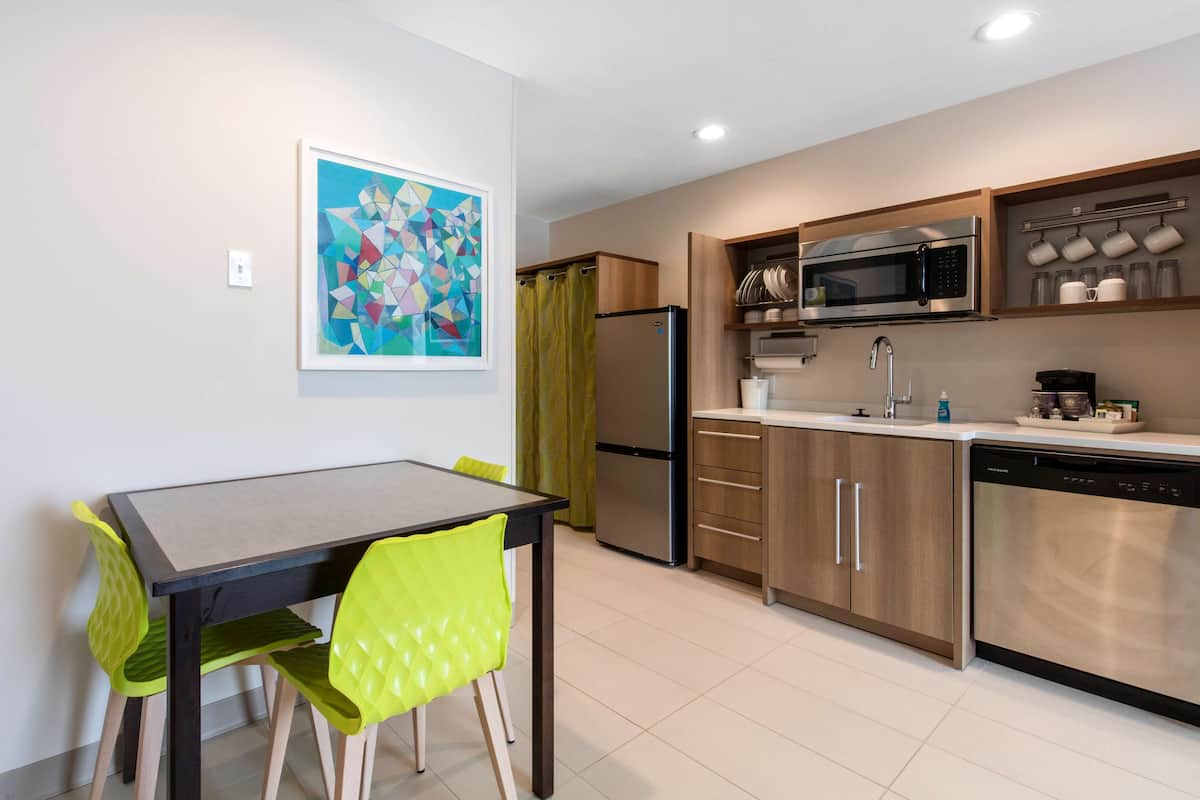 microwave, dishwasher, coffee/tea maker, cookware/dishes/utensils