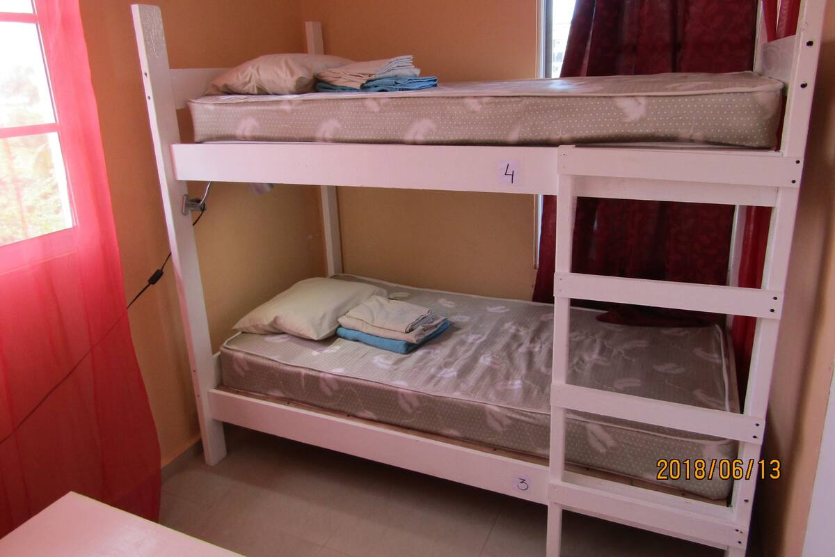 One Person Twin Bed in a Shared Room (4 beds in the room) | In-room safe, iron/ironing board (on request), rollaway beds (surcharge)