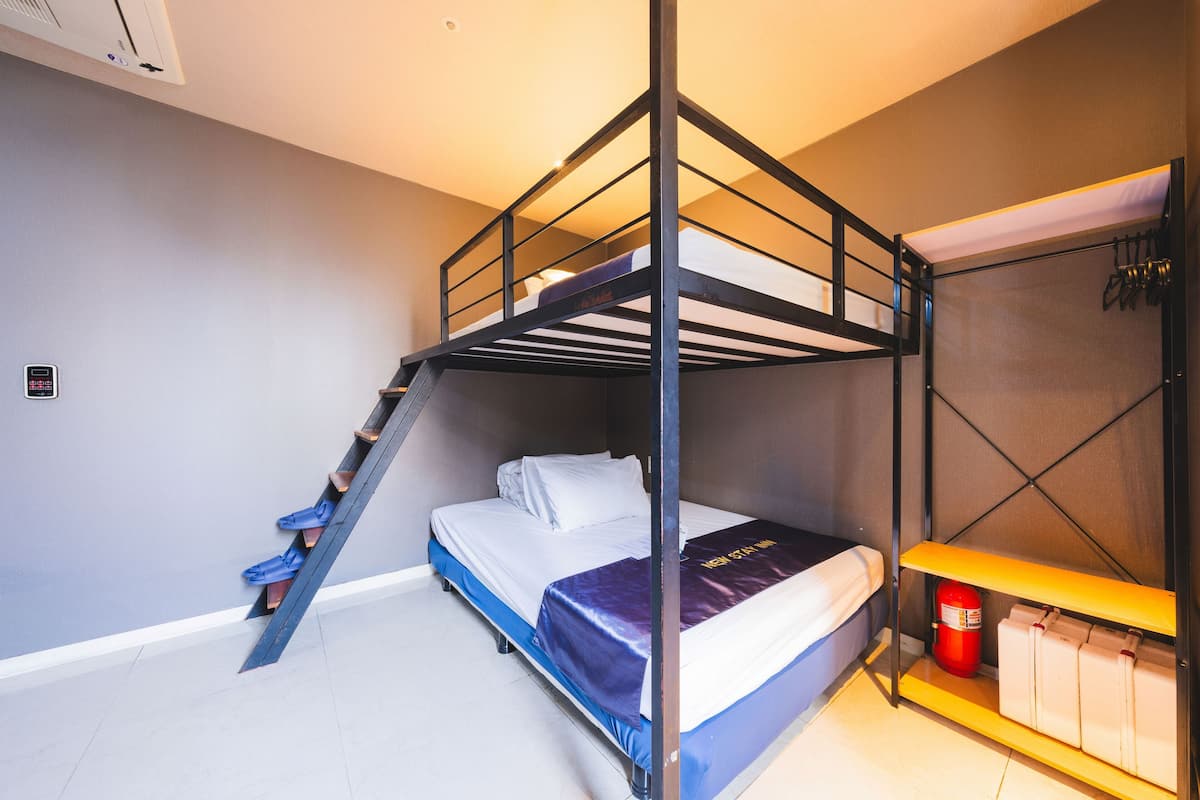 Deluxe Quadruple Room | Premium bedding, individually decorated, individually furnished, desk
