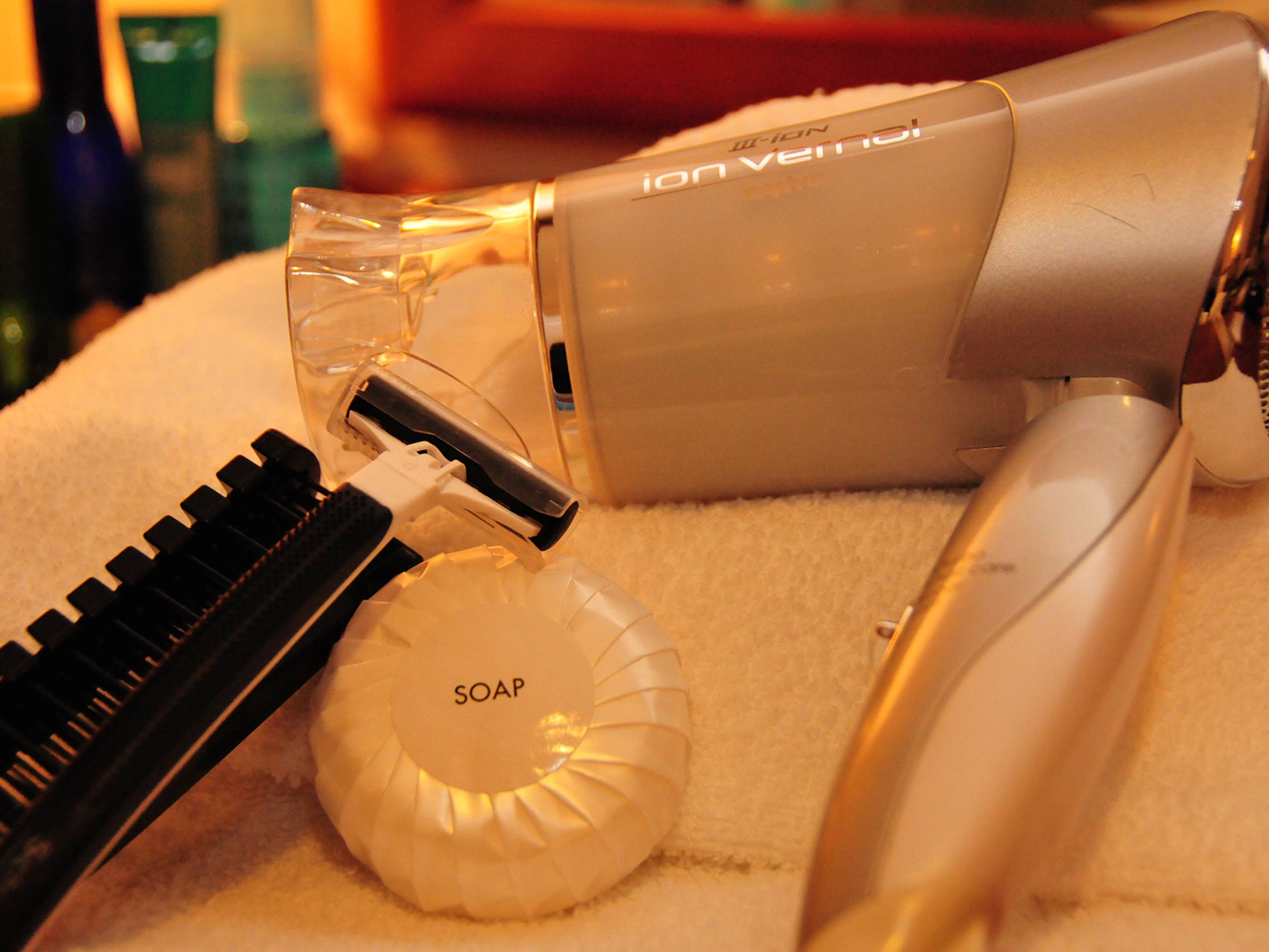 combined shower/bathtub, free toiletries, hair dryer, slippers