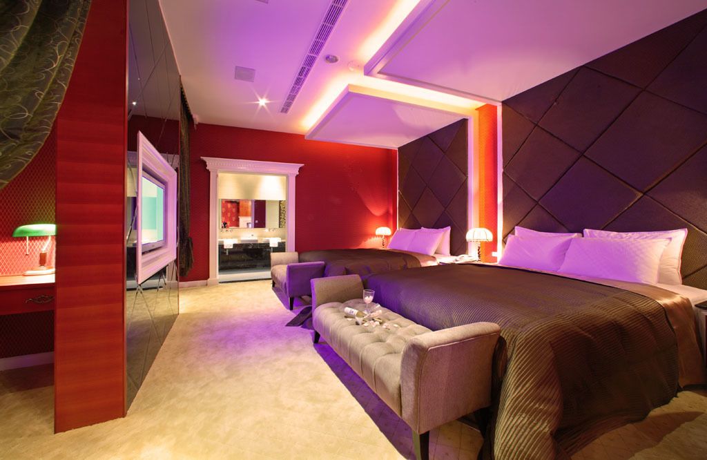 deluxe quadruple room, 2 queen beds | 1 bedroom, minibar, blackout curtains, soundproofing