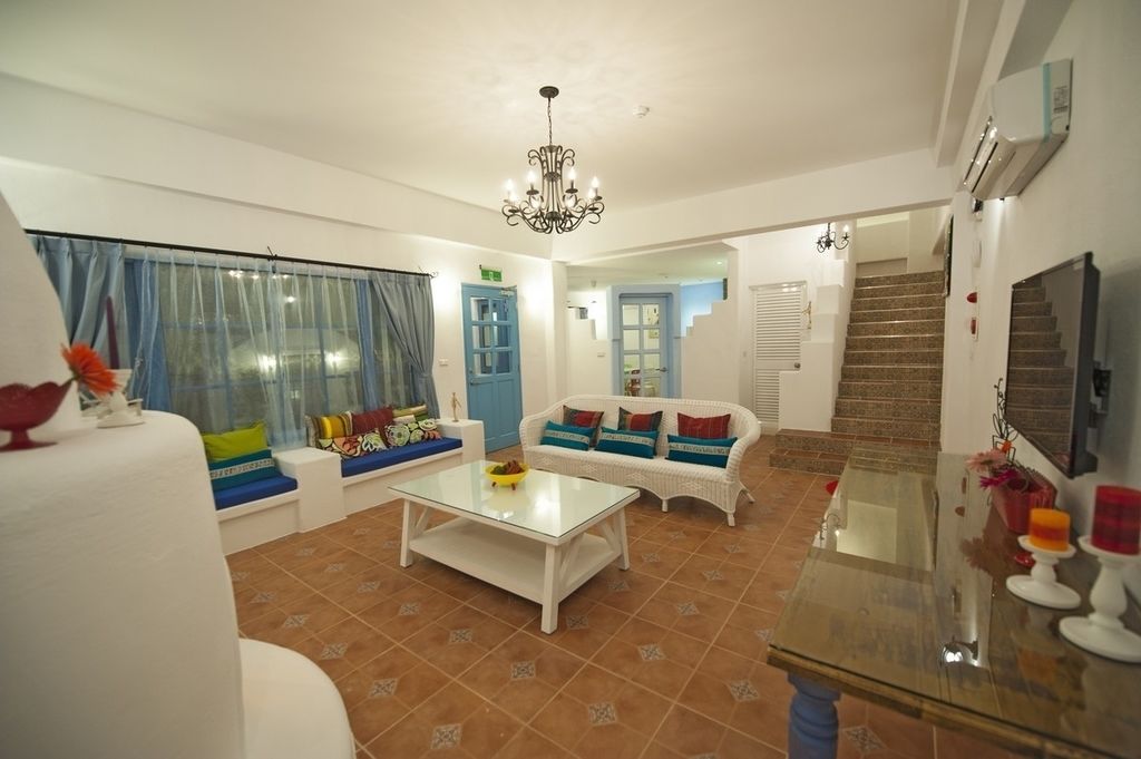deluxe villa, 2 bedrooms | living area | flat-screen tv