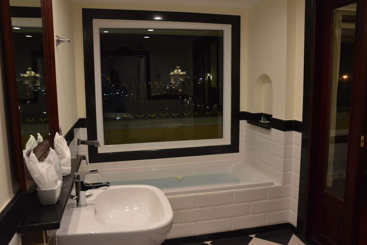 president view suite | bathroom | deep-soaking bathtub, free toiletries, hair dryer, bathrobes