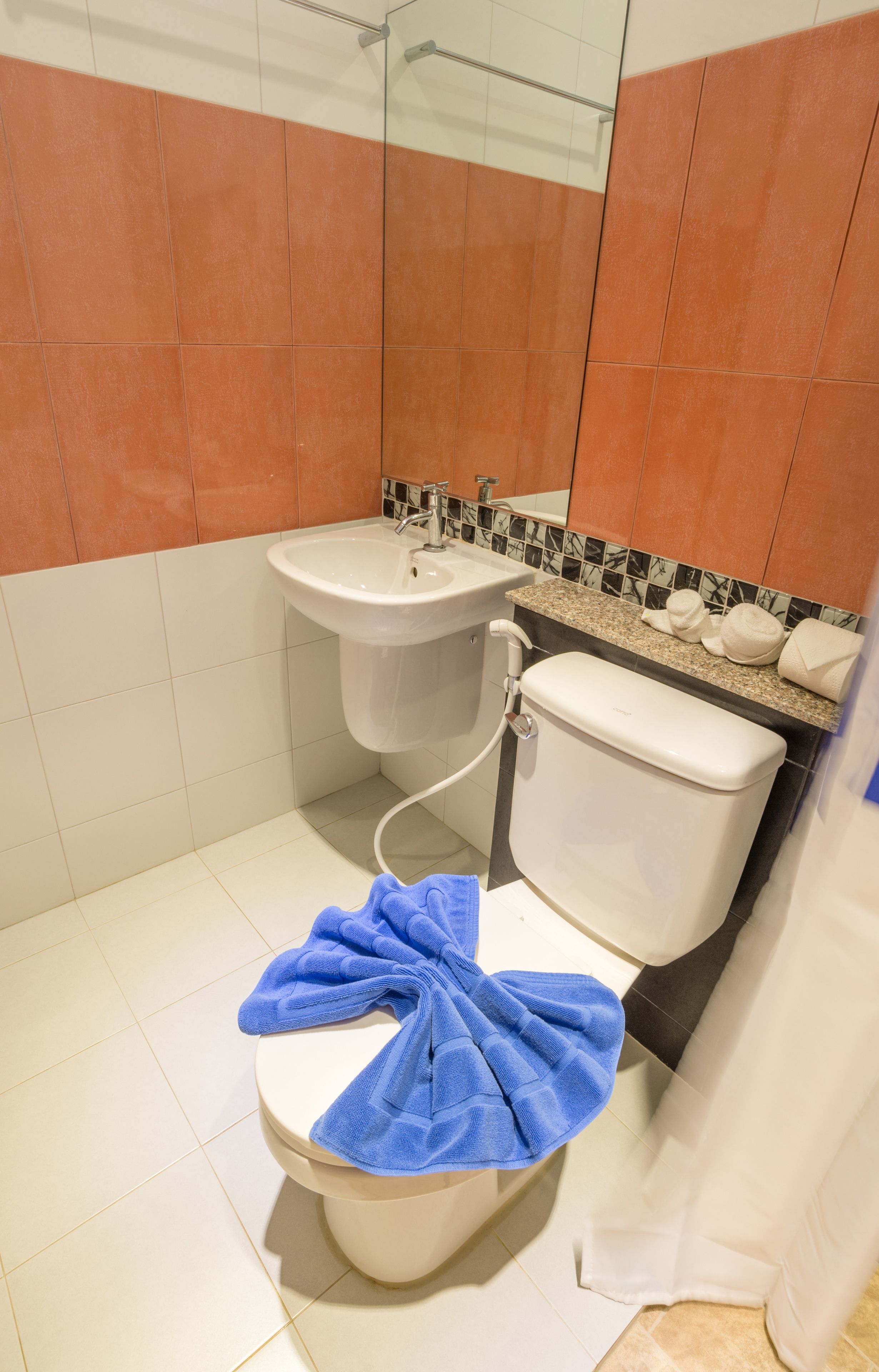 family room, 2 double beds | bathroom sink