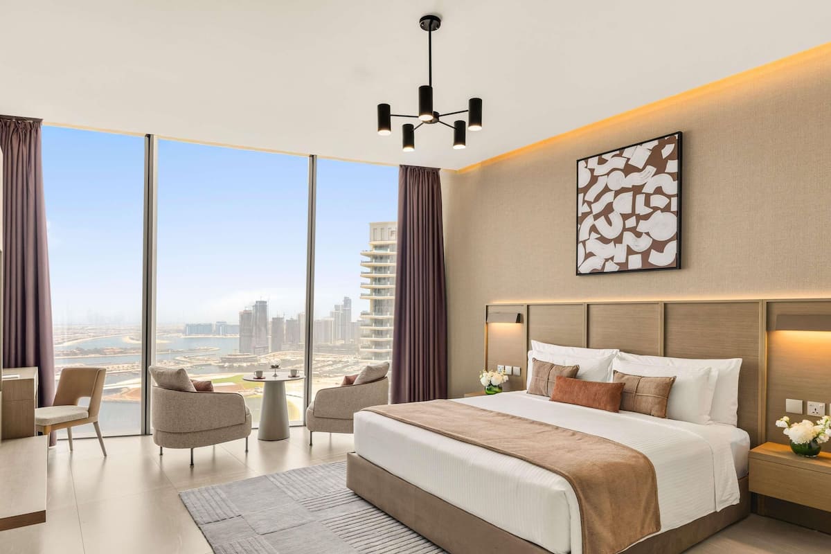 Deluxe Suite, 3 Bedrooms | Premium bedding, minibar (some free items), in-room safe, desk