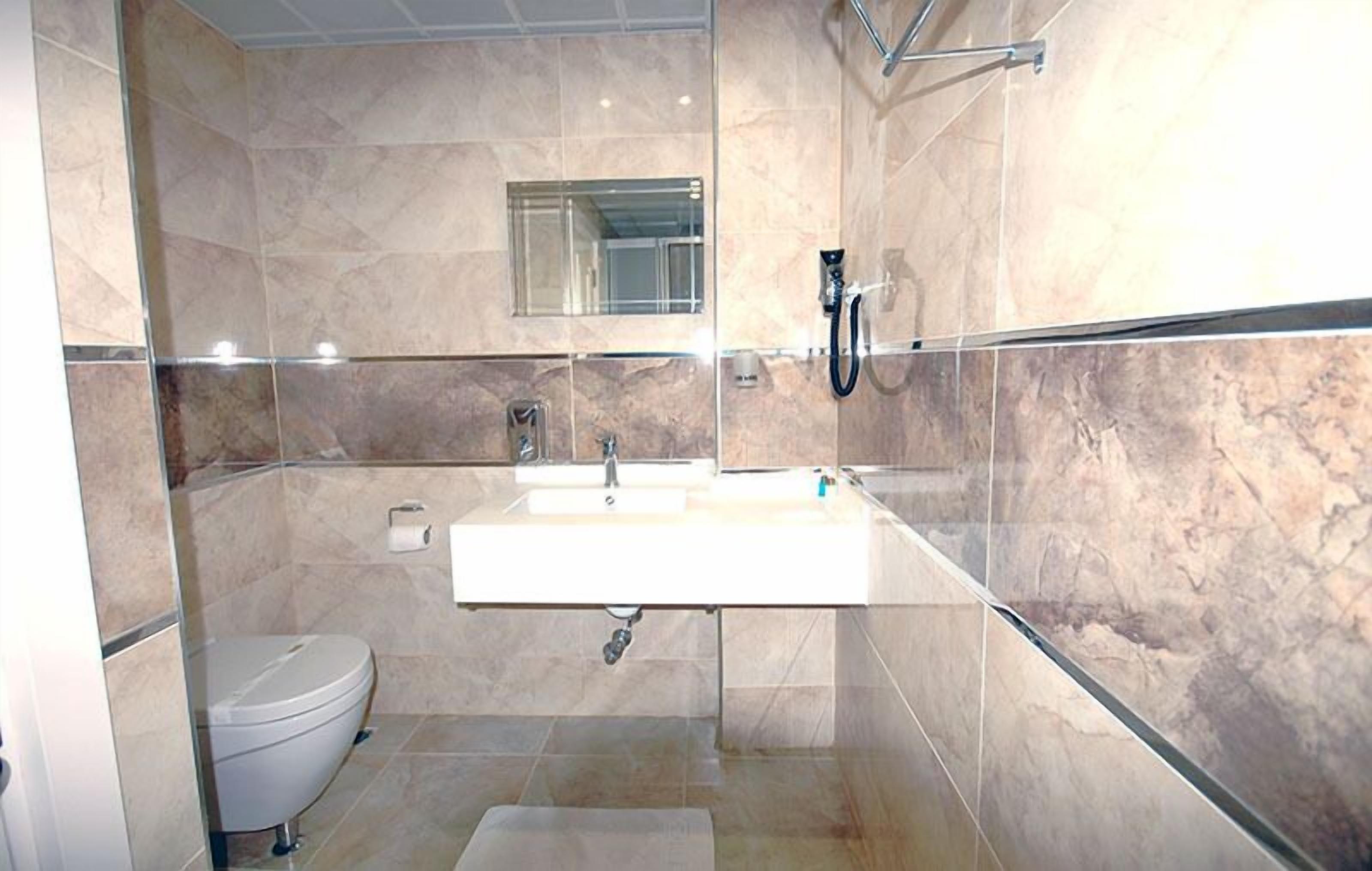 shower, free toiletries, hair dryer, slippers