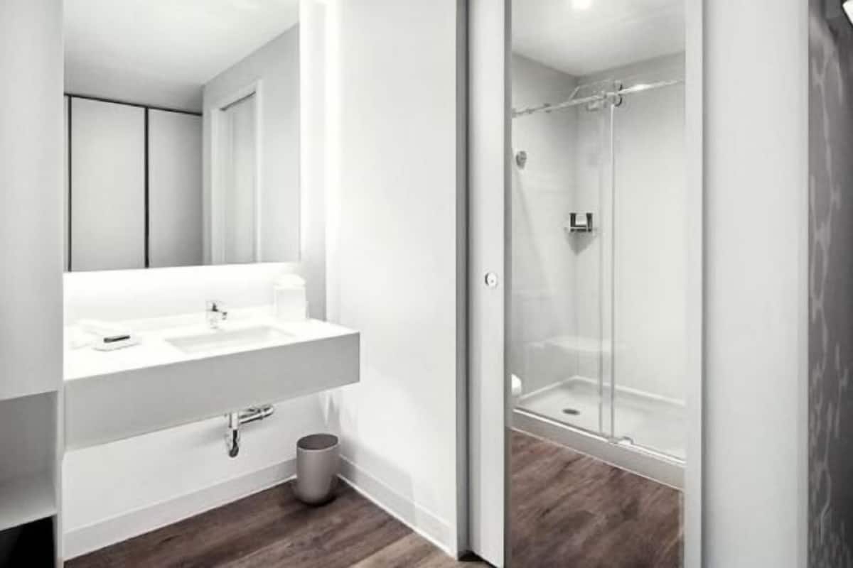 Bathroom | Shower, free toiletries, hair dryer, towels