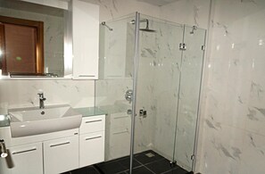 Shower, free toiletries, hair dryer, slippers