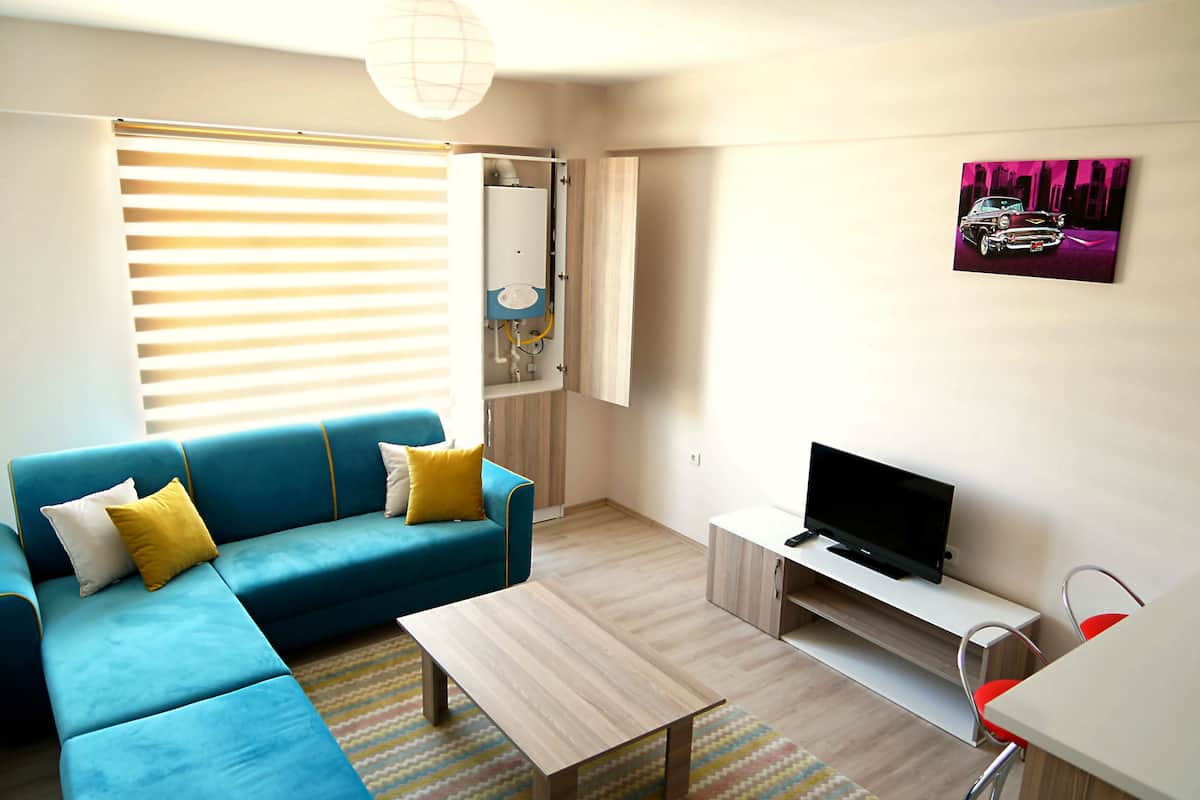 Suite, 1 Bedroom | Living area | LCD TV