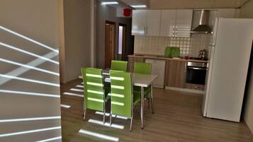 Suite, 2 chambres | Coin cuisine privé