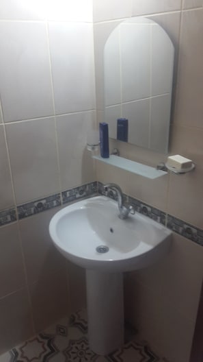 Bungalow, 1 Bedroom | Bathroom | Shower, free toiletries, slippers, towels