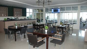 Breakfast, lunch, dinner served; local and international cuisine