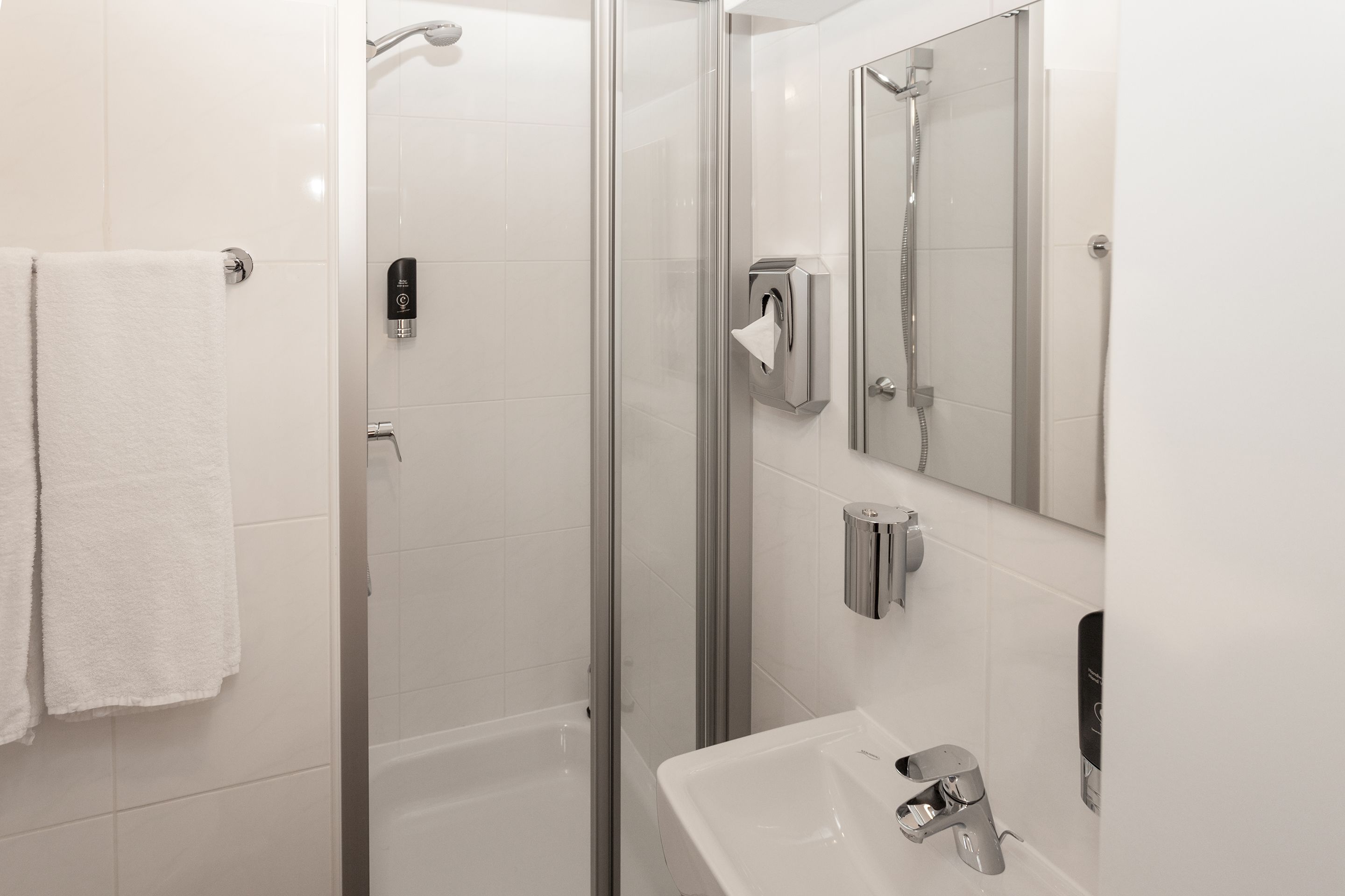 shower, free toiletries, hair dryer, towels