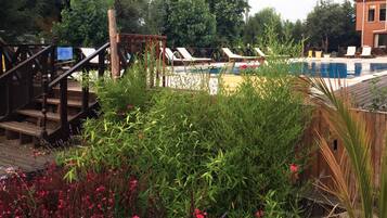 Seasonal outdoor pool, open 9 AM to 7:00 PM, sun loungers