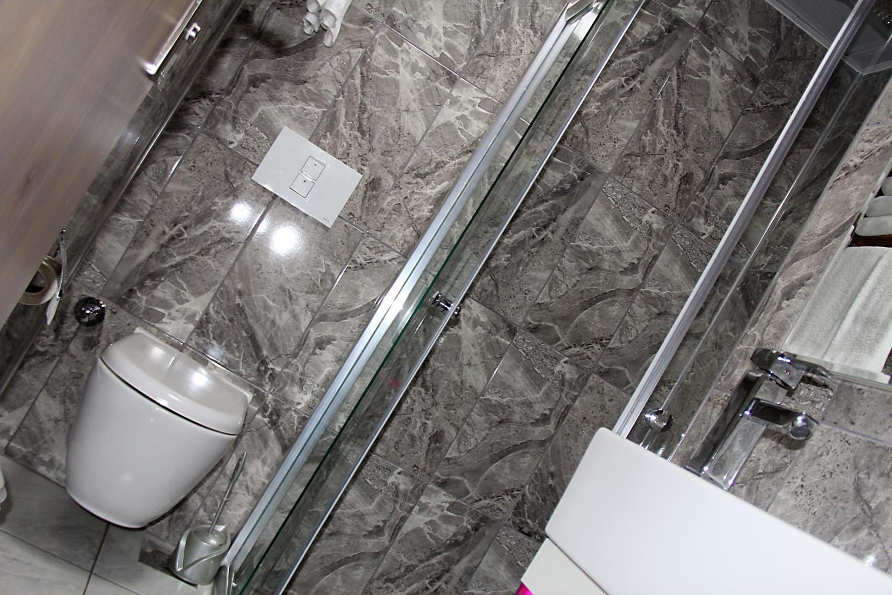 shower, free toiletries, hair dryer, slippers