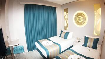 Egyptian cotton sheets, premium bedding, minibar, desk