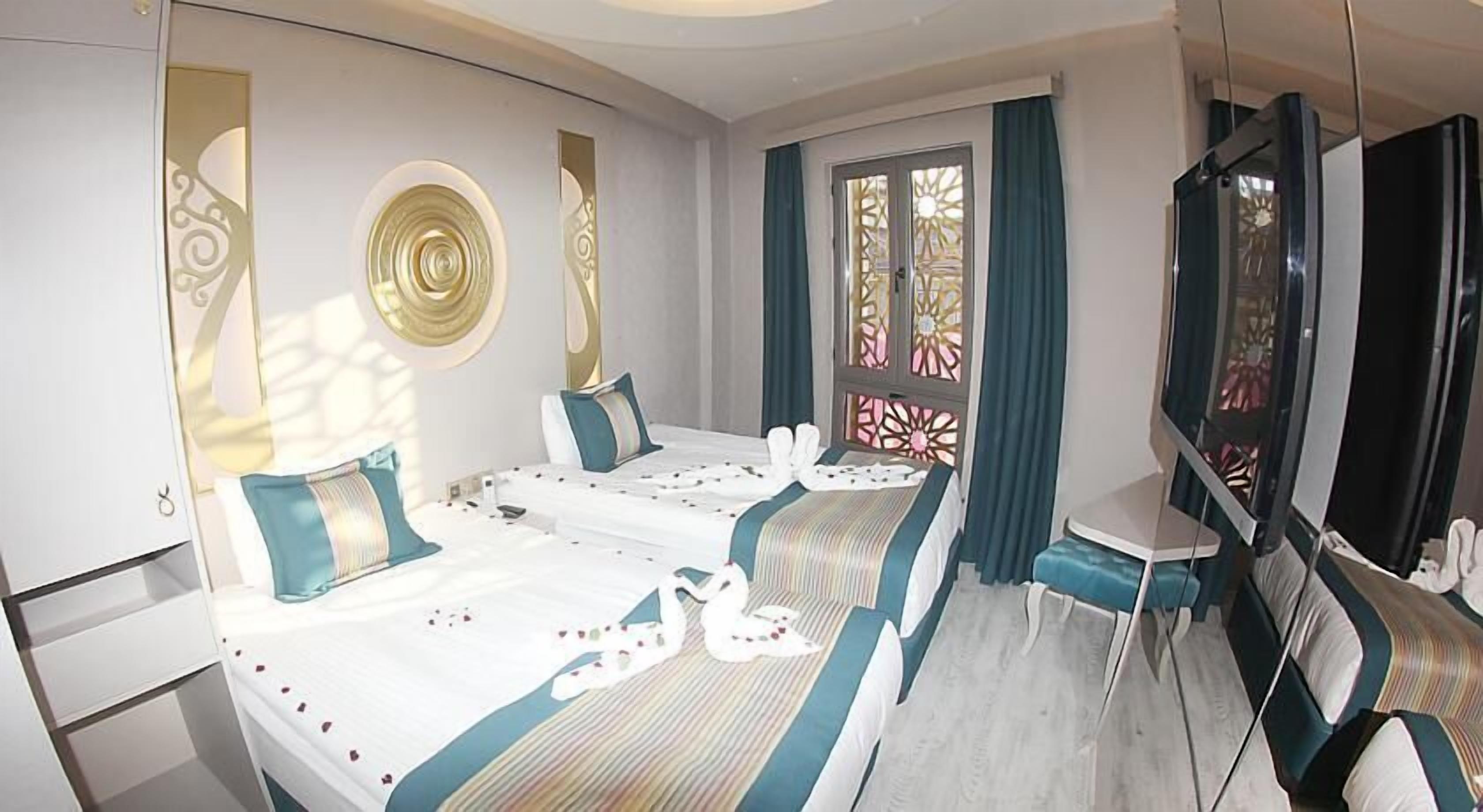 standard twin room | egyptian cotton sheets, premium bedding, minibar, desk