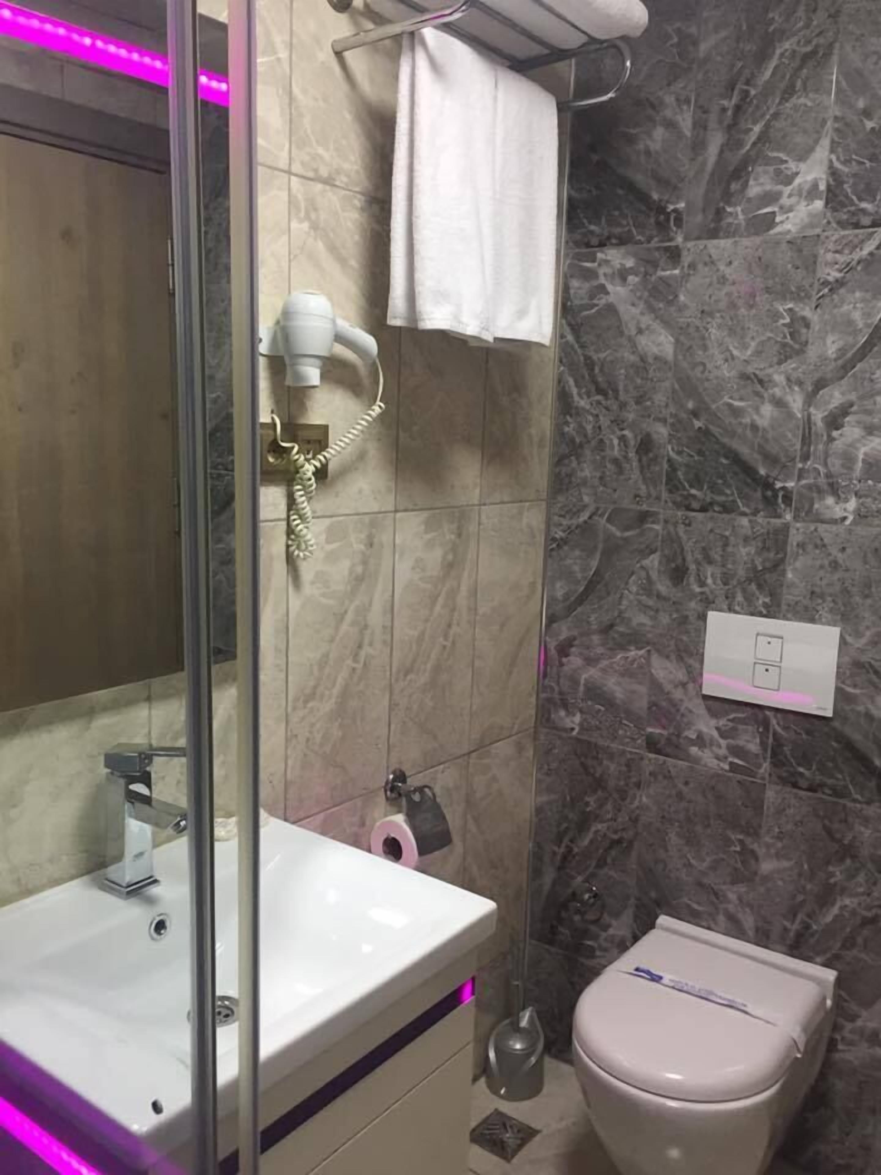 shower, free toiletries, hair dryer, slippers