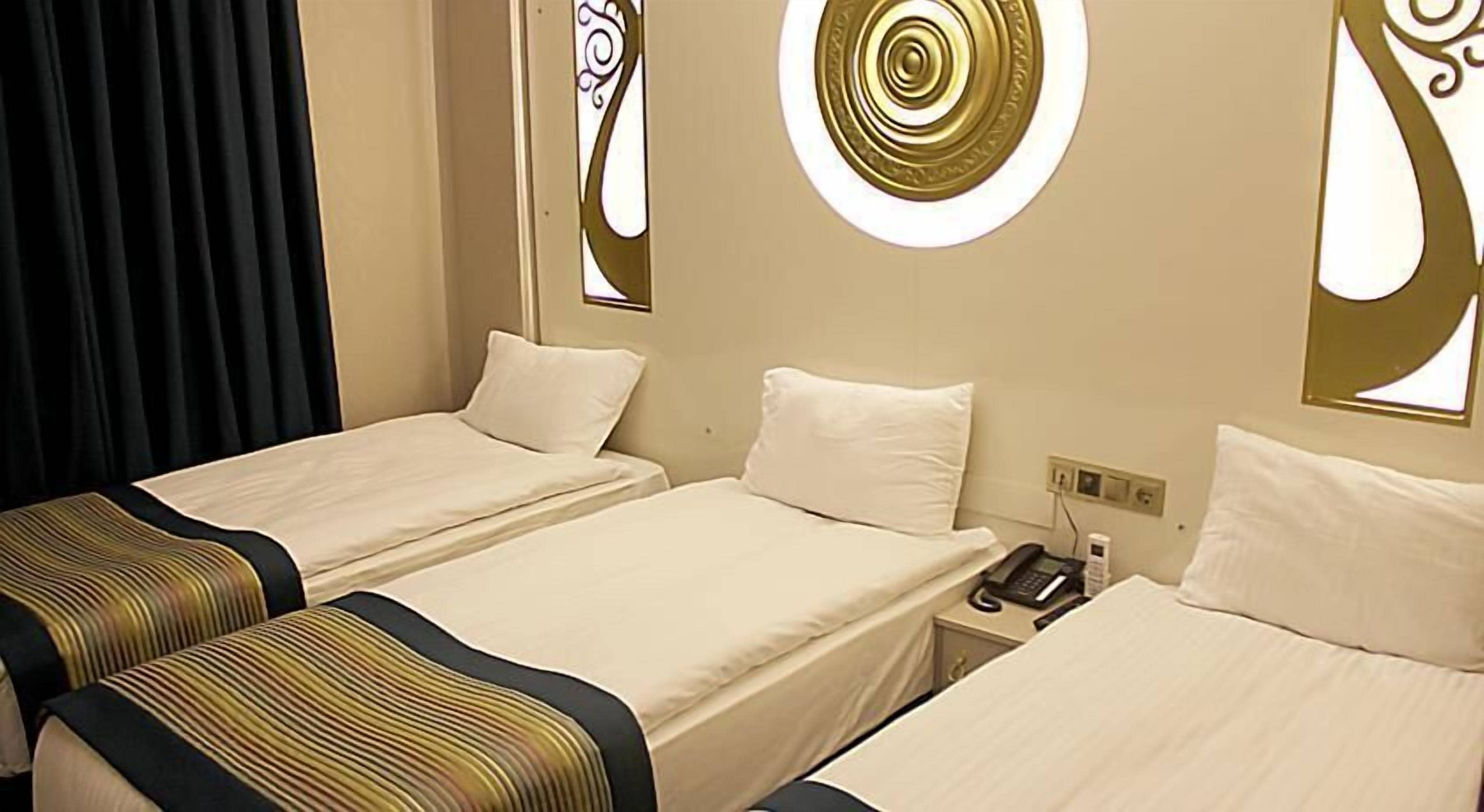 standard triple room | egyptian cotton sheets, premium bedding, minibar, desk