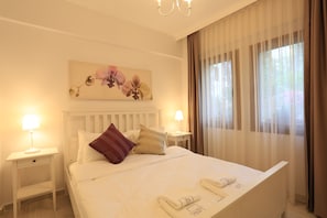 Apartment, Garden View | Premium bedding, in-room safe, individually decorated
