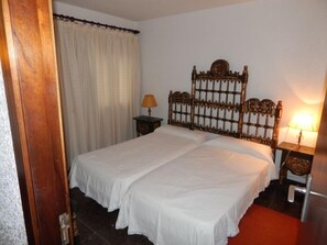 Apartment, 1 Bedroom, Sea View | 1 bedroom, blackout curtains, cots/infant beds, free WiFi