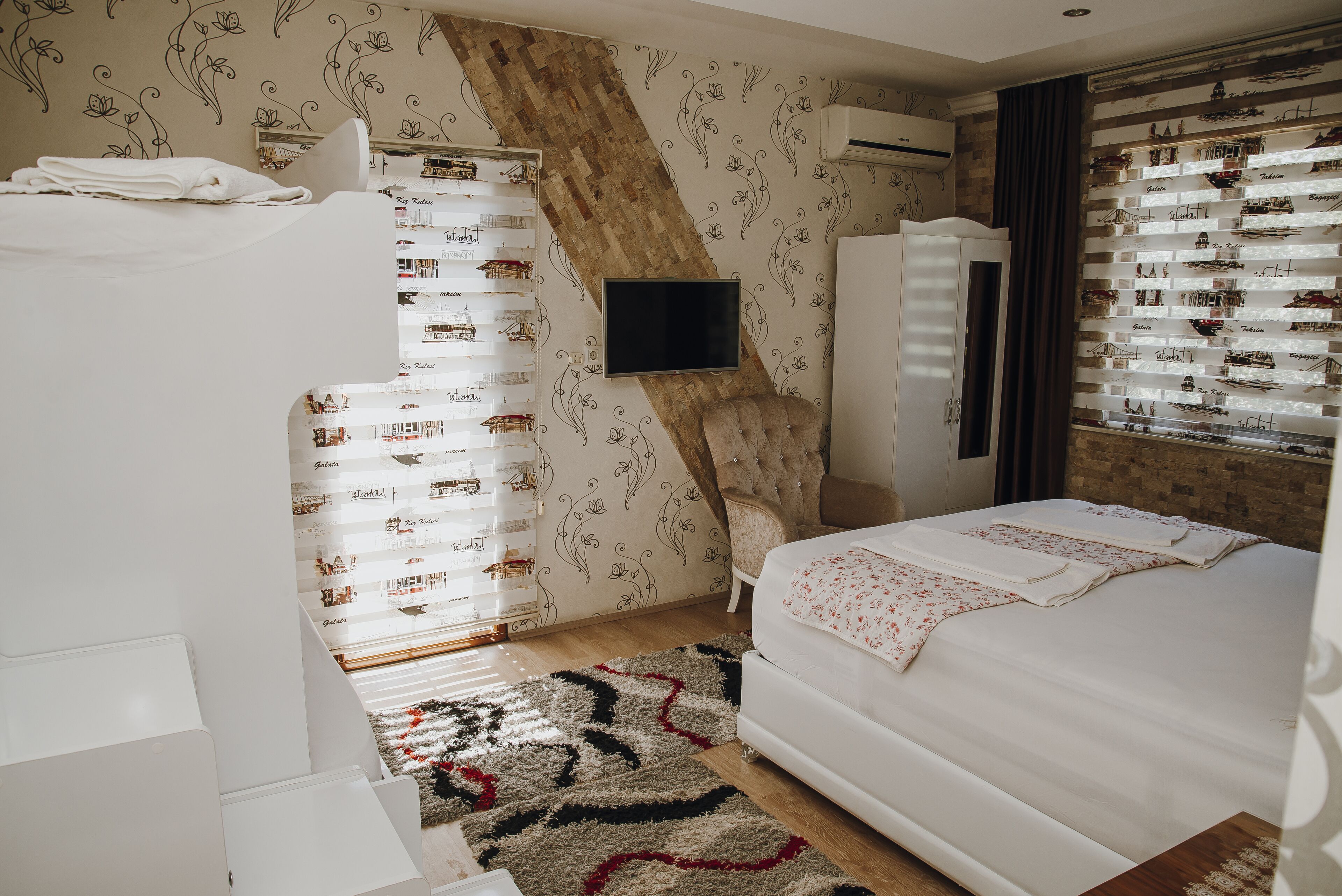 deluxe quadruple room, mixed dorm, lanai, garden view | premium bedding, soundproofing, iron/ironing board, cots/infant beds