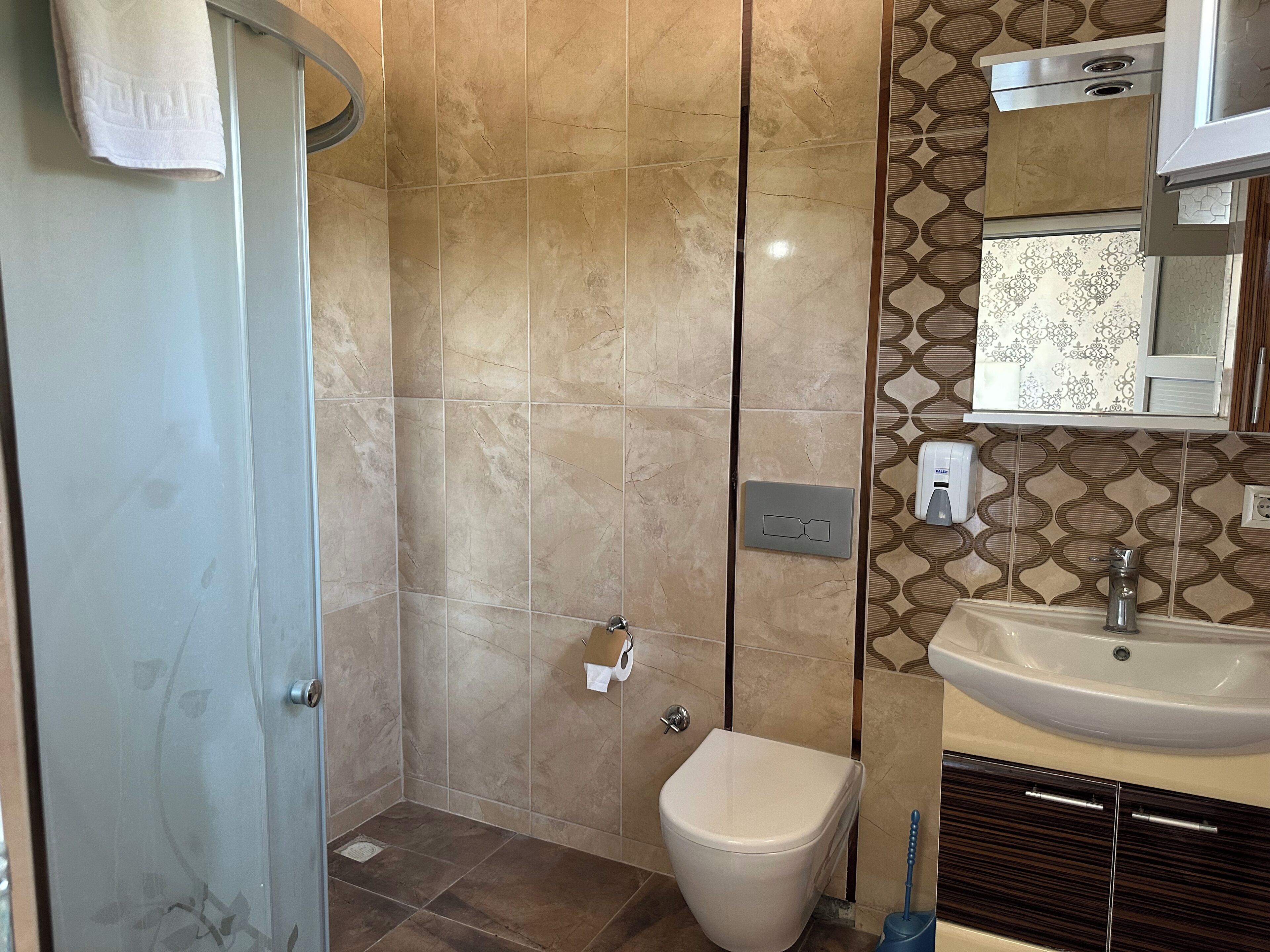 deluxe quadruple room, mixed dorm | bathroom | shower, free toiletries, hair dryer, towels