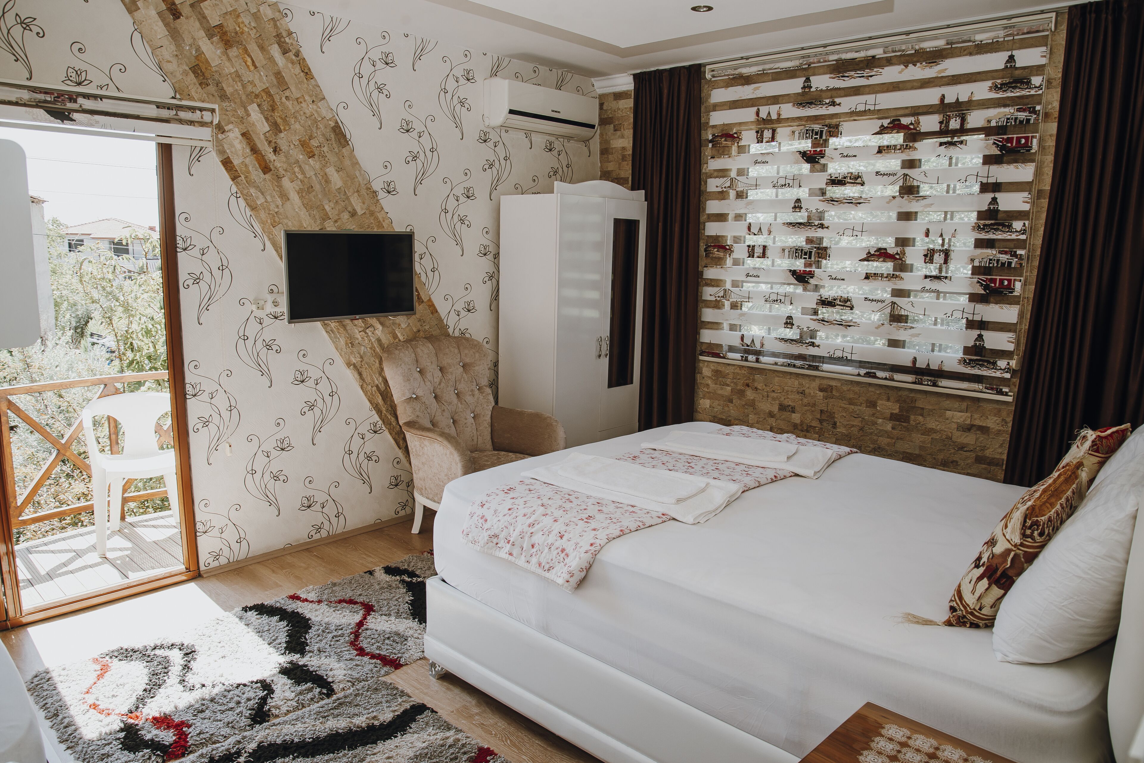 deluxe quadruple room, mixed dorm, lanai, garden view | premium bedding, soundproofing, iron/ironing board, cots/infant beds