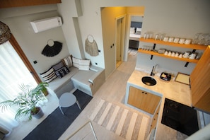 Apartment, 2 Bedrooms, Partial Sea View | Premium bedding, in-room safe, individually decorated