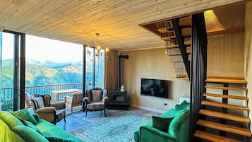 Deluxe Villa | Living area | LCD TV
