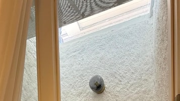 Economy Room | Memory foam beds, minibar, in-room safe, individually decorated