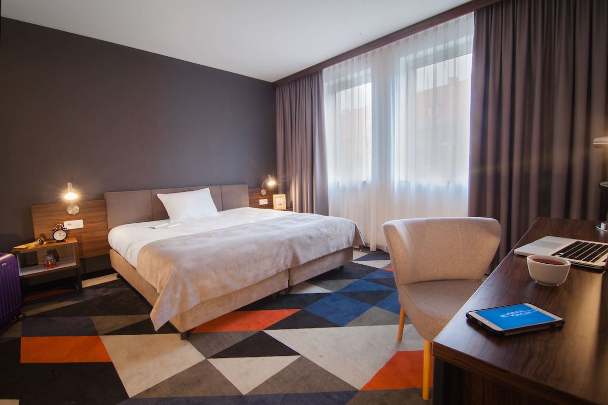 Deluxe eenpersoonskamer | Een kluis op de kamer, geluiddichte muren, gratis wifi, beddengoed