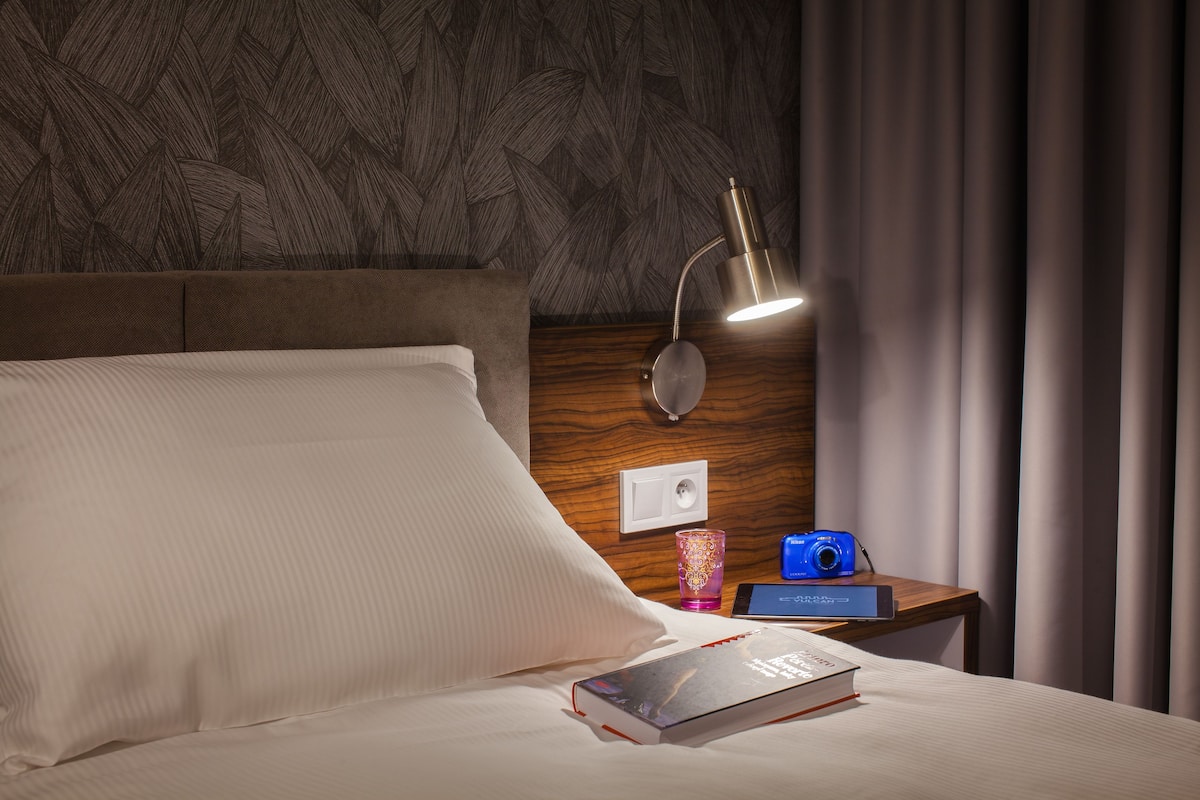 Eenpersoonskamer | Een kluis op de kamer, geluiddichte muren, gratis wifi, beddengoed