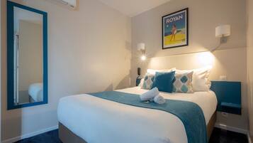 Quarto superior | Roupas de cama premium, quartos à prova de som, Wi-Fi de cortesia