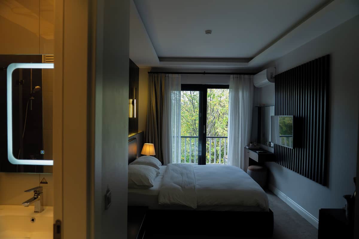 Quarto família, quartos conectados | Roupas de cama premium, camas Select Comfort, frigobar