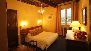 Standard Double Room | Minibar, in-room safe, individually decorated, desk