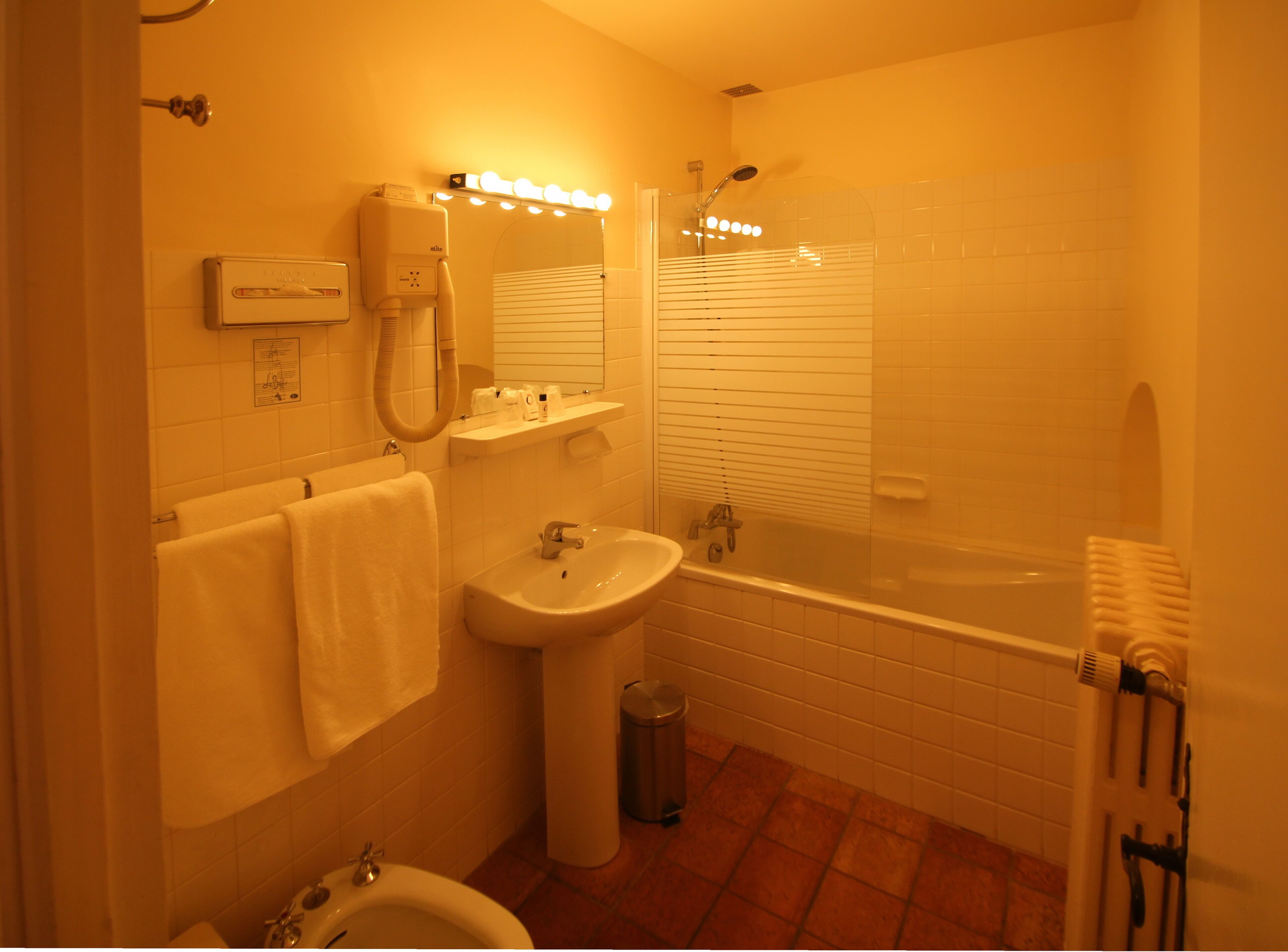 superior triple room | bathroom | shower, free toiletries, hair dryer, towels
