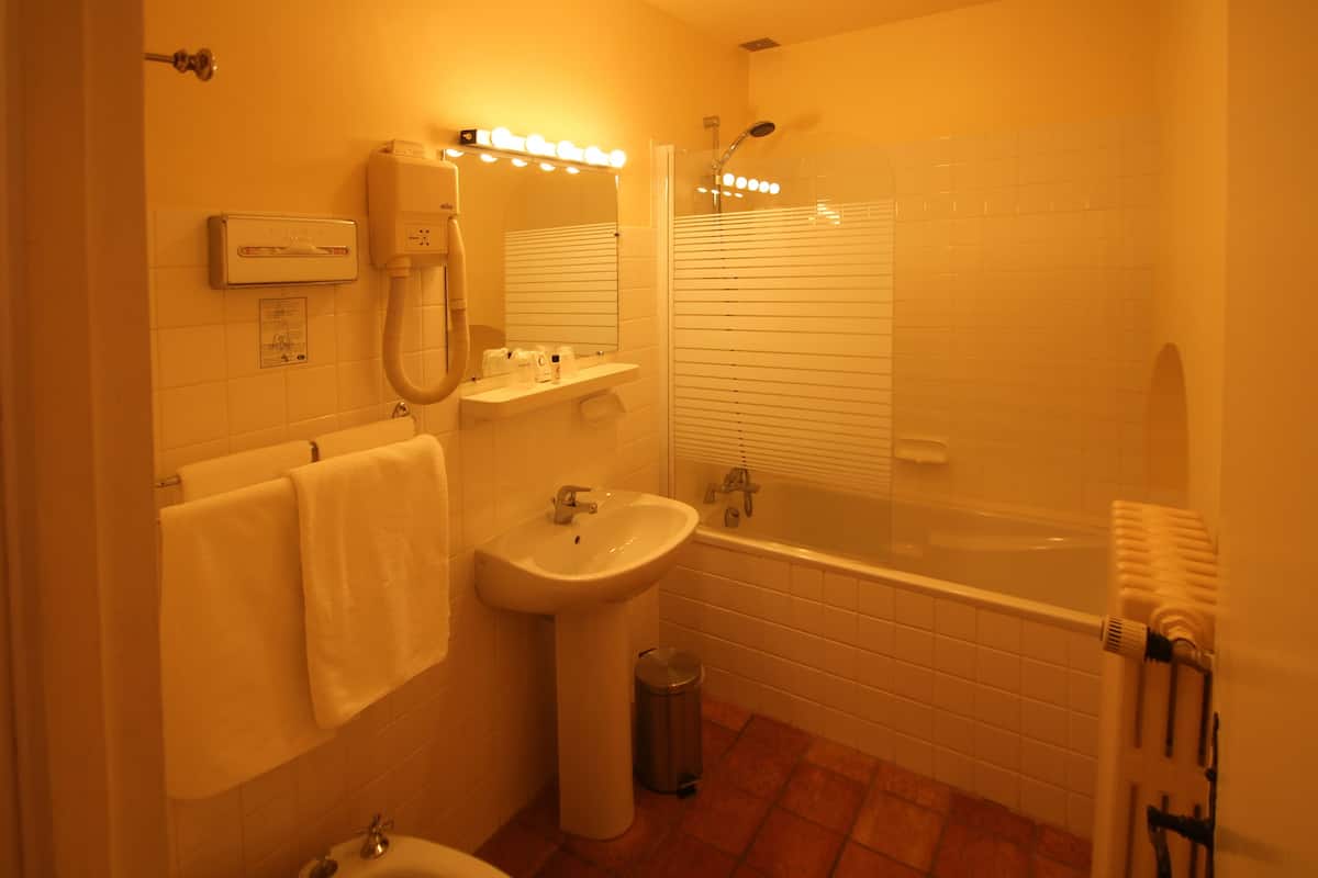 superior triple room | bathroom | shower, free toiletries, hair dryer, towels