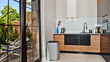 Apartment, 1 Bedroom, Terrace (ul. Ogrodowa 136/A1) | Private kitchen | Full-sized fridge, microwave, oven, stovetop