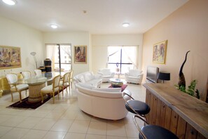 Apartment, 3 Bedrooms | Living room | TV - Kennedy Towers - Sadaf 1 (Dubai)