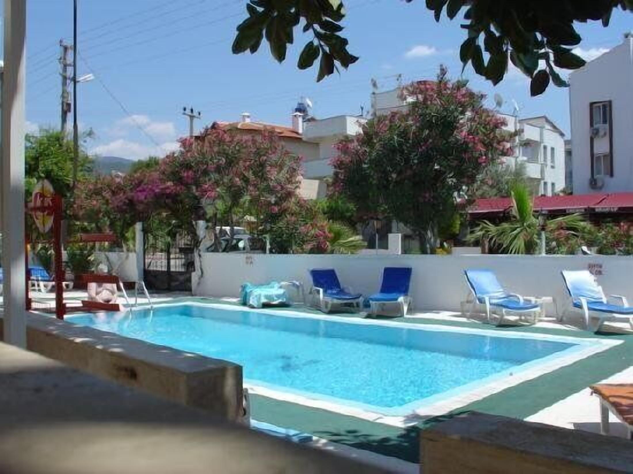 outdoor pool, pool umbrellas, pool loungers