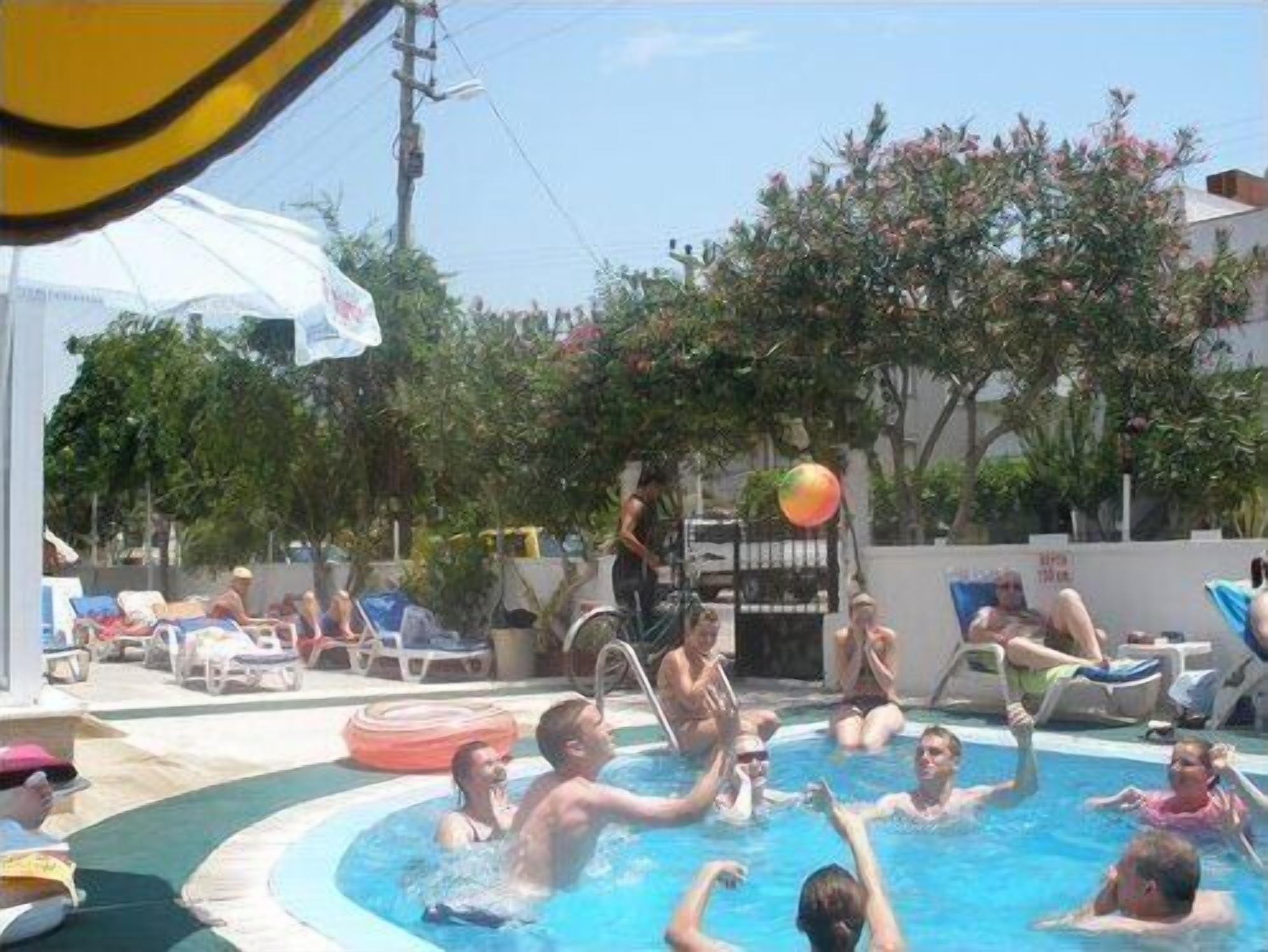 outdoor pool, pool umbrellas, pool loungers