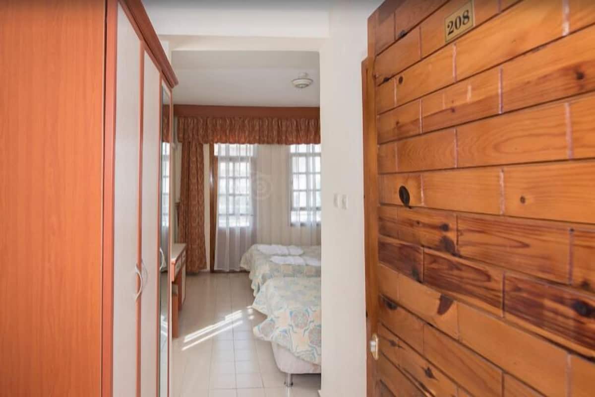 Iron/ironing board (on request), cribs (free), rollaway beds (surcharge)