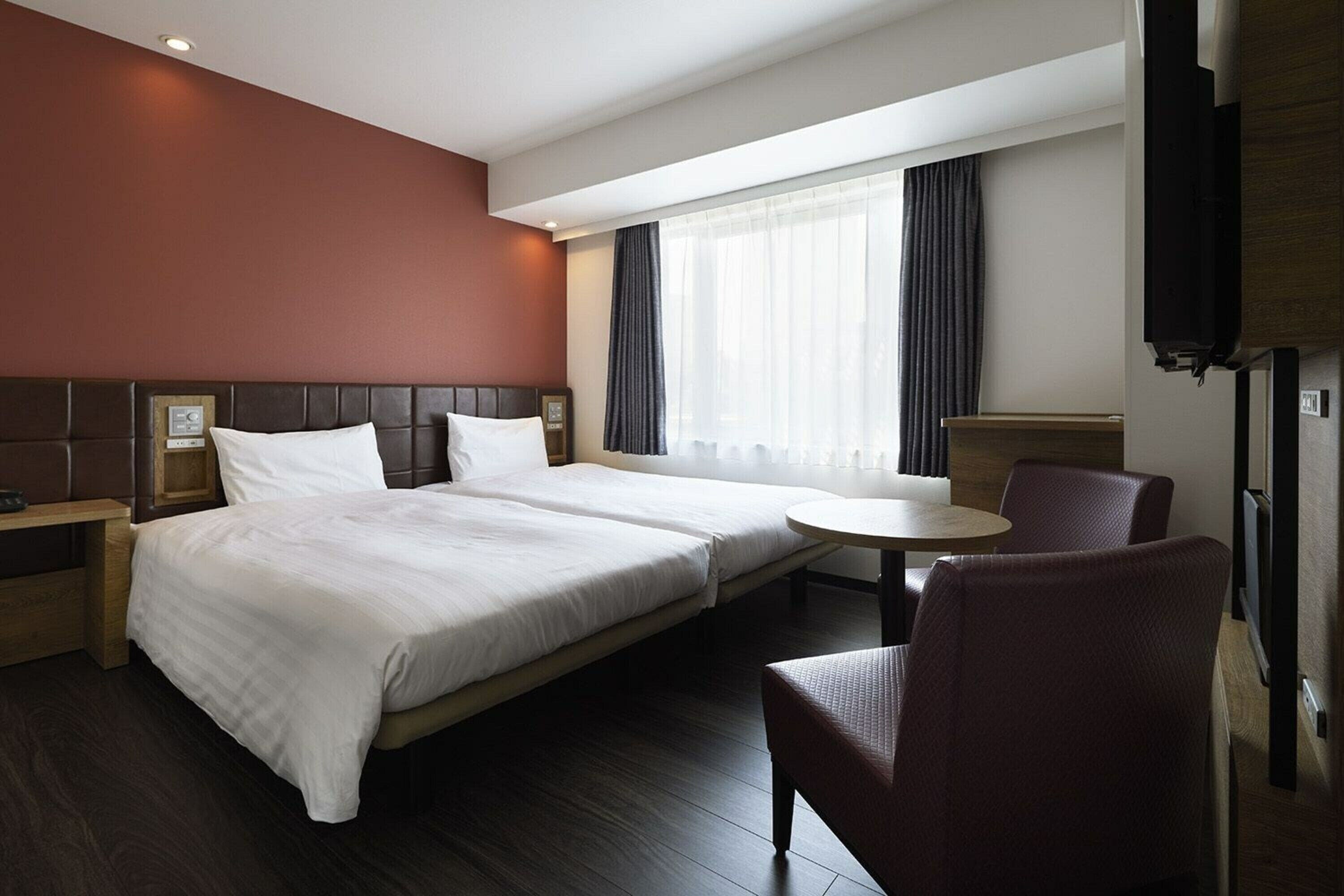 standard twin room, non smoking | down duvets, desk, blackout curtains, iron/ironing board