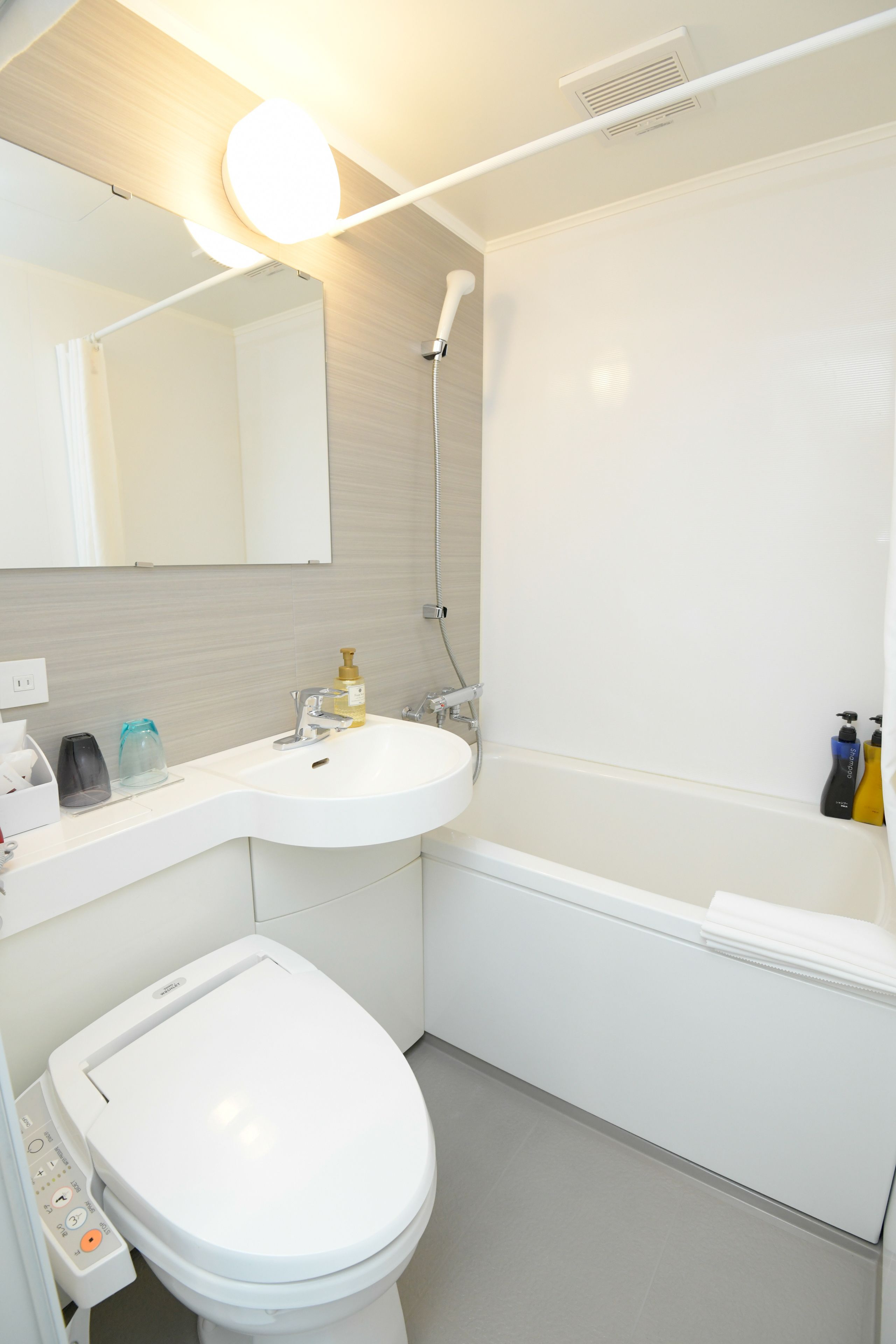 combined shower/bathtub, free toiletries, hair dryer, bathrobes