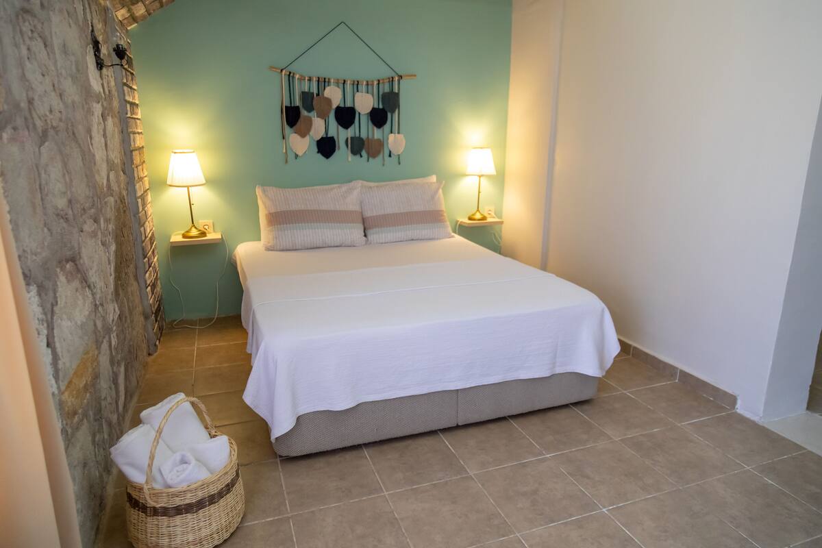 Habitación cuádruple familiar, para no fumadores, vista al jardín | 1 habitación, wifi gratis y ropa de cama