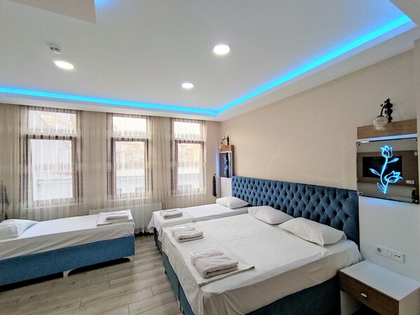 Luxury Quadruple Room | Premium bedding, minibar, desk, blackout drapes - Grafen Hotel (Istanbul)