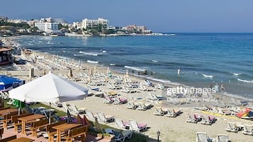 On the beach, white sand