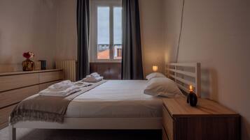 Apartment, 1 Bedroom | 1 bedroom, iron/ironing board, cots/infant beds, free WiFi